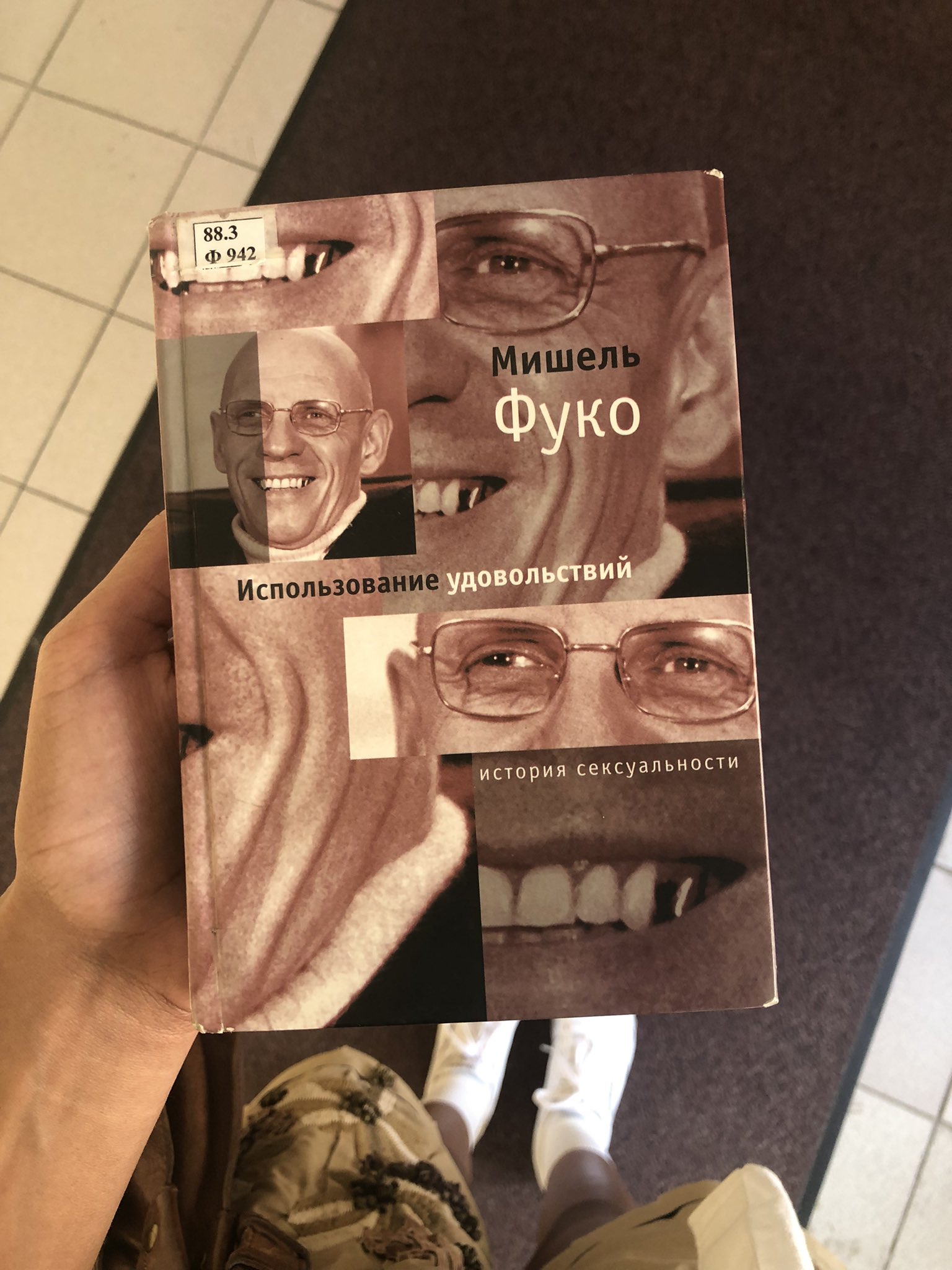 the cover is made of several pictures of foucault with different zoom of his eyes, his mouth..